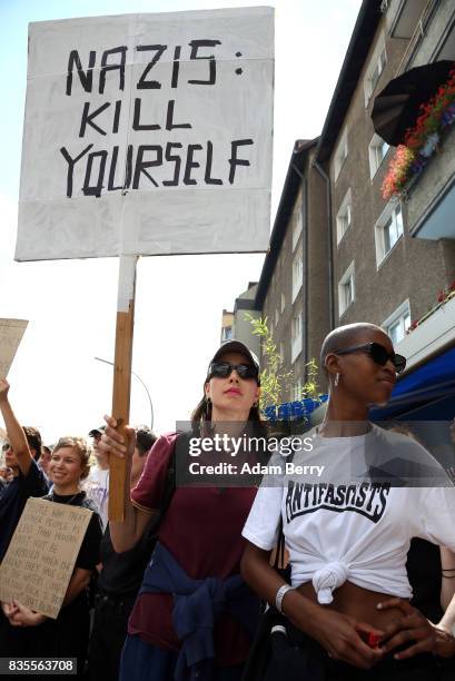 Left-wing activists protest against Neo-Nazis at an extreme right-wing demonstration commemorating the 30th anniversary of the death of Nazi leader...