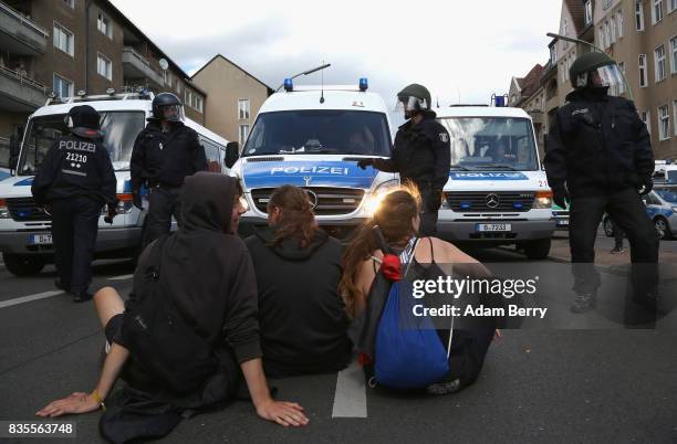 Left-wing activists block the path of a march of Neo-Nazis at an extreme right-wing demonstration commemorating the 30th anniversary of the death of...