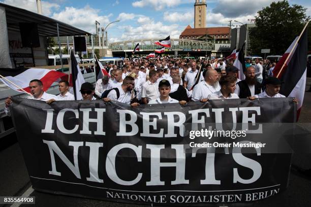 Some 1000 participants affiliated with Neo-Nazi and extreme right groups marched through the street of Berlin's Spandau district in commemoration of...