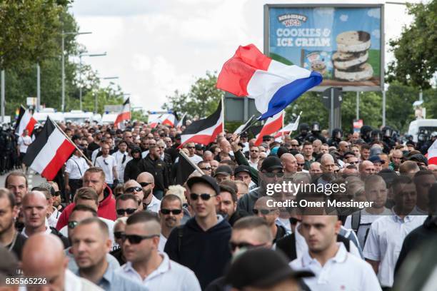 Some 1000 participants affiliated with Neo-Nazi and extreme right groups marched through the street of Berlin's Spandau district in commemoration of...