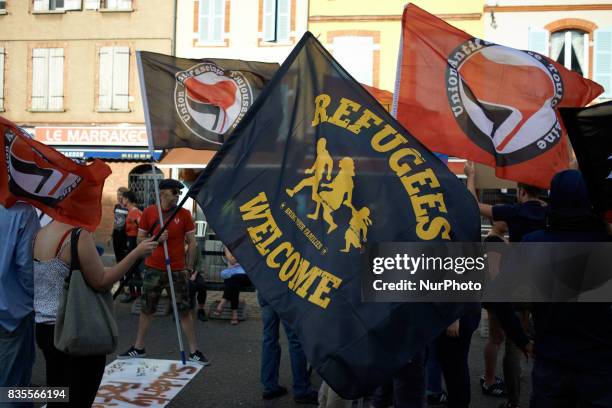 Flag reading 'Refugees Welcome' during a gathering in Toulouse in solidarity with anti-fascists in Charlottesville after the killing of Heather Heyer...