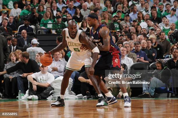 Kevin Garnett of the Boston Celtics drives the ball against LeBron James of the Cleveland Cavaliers during the game on October 28, 2008 at the TD...