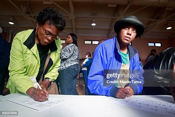 Two African-Americans women vote in a recreation center in the presidential election November 4, 2008 in Birmingham, Alabama. Birmingham, along with...