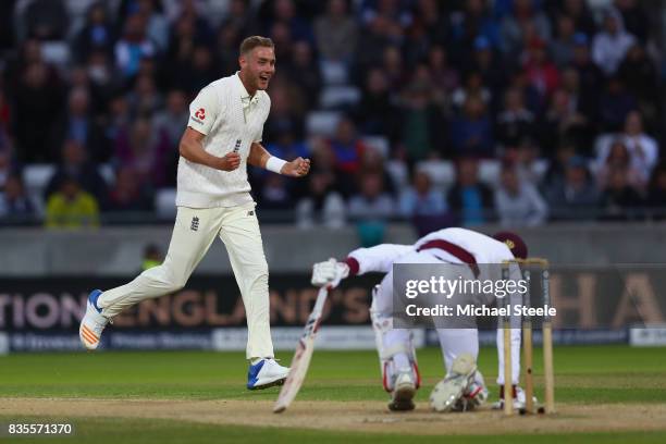 Stuart Broad of England celebrates trapping Roston Chase lbw during day three of the 1st Investec Test match between England and West Indies at...