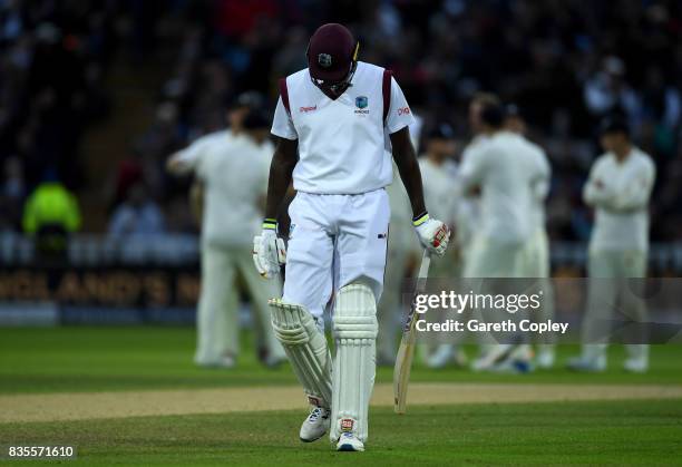 West Indies captain Jason Holder leaves the field after being dismissed by Stuart Broad of England during day three of the 1st Investec Test between...