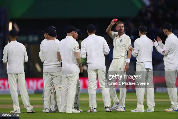 Stuart Broad of England acknowledges the crowds applause after taking the wicket of Shane Dowrich to become England's second highest wicket taker in...