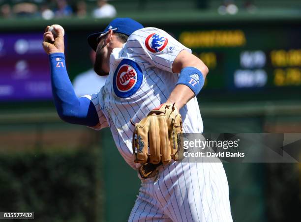 Kris Bryant of the Chicago Cubs catches a line drive hit by Kevin Pillar of the Toronto Blue Jays during the second inning on August 19, 2017 at...