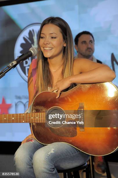 Taylor Dye of Maddie & Tae performs at Macy's at Macy's Herald Square on August 19, 2017 in New York City.