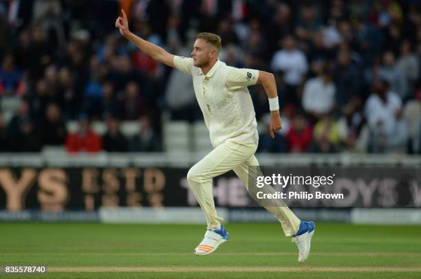 Stuart Broad of England celebrates after dismissing Jason Holder of the West Indies during the third day of the 1st Investec Test match between...