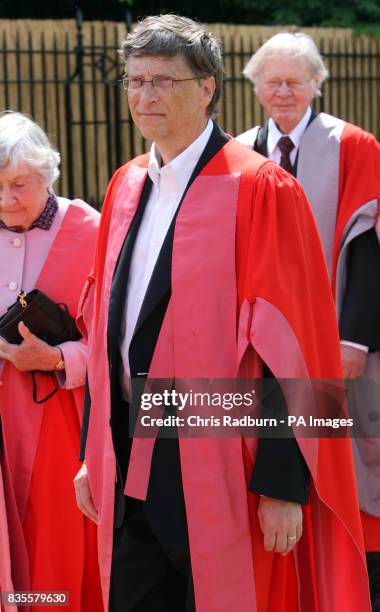 Bill Gates, founder of The Microsoft Corporation, walks in a procession at the Senate House at Cambridge University, before being made an honorary...