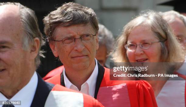 Bill Gates , founder of The Microsoft Corporation, walks in a procession at the Senate House at Cambridge University, before being made an honorary...