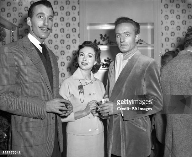 Hammer film stars , Christopher Lee, Hazel Court and Anton Diffring at the Hammer Films Christmas Party.
