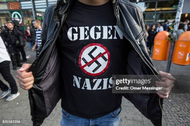 Protester wearing a t-shirt reading 'against Nazis' during a march on August 19, 2017 in Berlin, Germany. Some 1000 participants affiliated with...