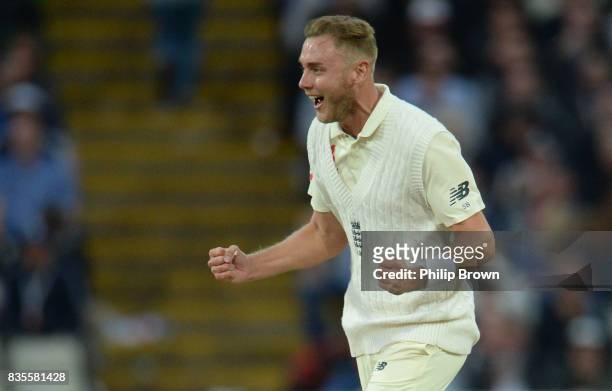 Stuart Broad of England celebrates after dismissing Roston Chase of the West Indies during the third day of the 1st Investec Test match between...