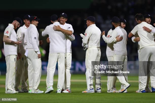 The England players celebrate a innings and 209 victory as the last wicket falls during day three of the 1st Investec Test match between England and...