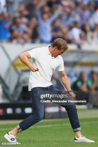 Julian Nagelsmann, head coach of Hoffenheim, celebrates his first team goal during the Bundesliga match between TSG 1899 Hoffenheim and SV Werder...