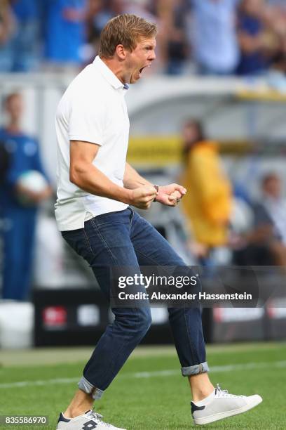 Julian Nagelsmann, head coach of Hoffenheim, celebrates his first team goal during the Bundesliga match between TSG 1899 Hoffenheim and SV Werder...