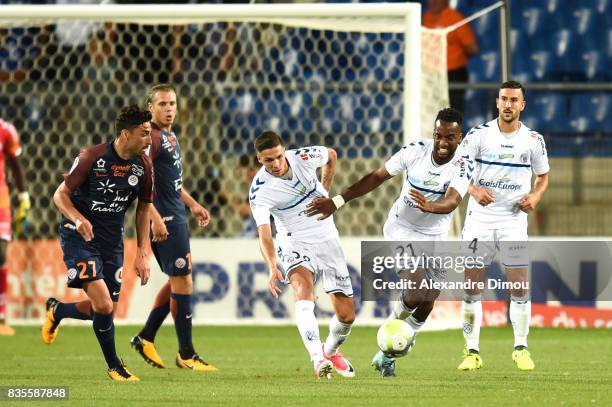 Jonas Martin and Yoann Salmier of Strasbourg during the Ligue 1 match between Montpellier Herault SC and Strasbourg at Stade de la Mosson on August...