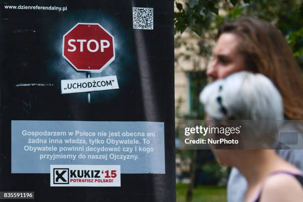 Refugees'! - members of Kukiz '15, a right-wing political movement, collect signatures in Krakow's city center, Poland, on 19 August 2017 for...