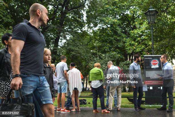 Refugees'! - members of Kukiz '15, a right-wing political movement, collect signatures in Krakow's city center, Poland, on 19 August 2017 for...