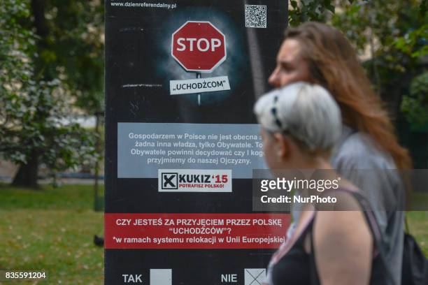 Refugees'! - members of Kukiz '15, a right-wing political movement, collect signatures in Krakow's city center, Poland, on 19 August 2017 for...