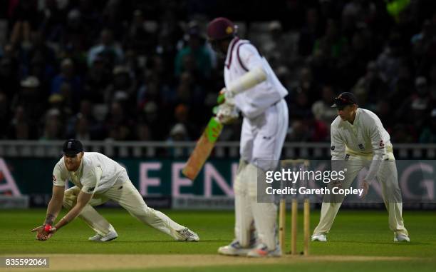 Ben Stokes of England catches out Alzarri Joseph of the West Indies during day three of the 1st Investec Test between England and the West Indies at...