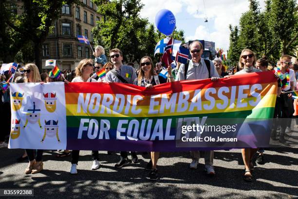 Participants are seen at the Copenhagen Pride Parade on August 19, 2017 in Copenhagen, Denmark. According to authorities, about 300,000 spectators...