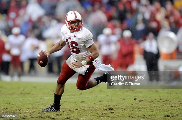 Russell Wilson of the North Carolina State Wolfpack runs with the ball against the Maryland Terrapins on October 25, 2008 at Byrd Stadium in College...