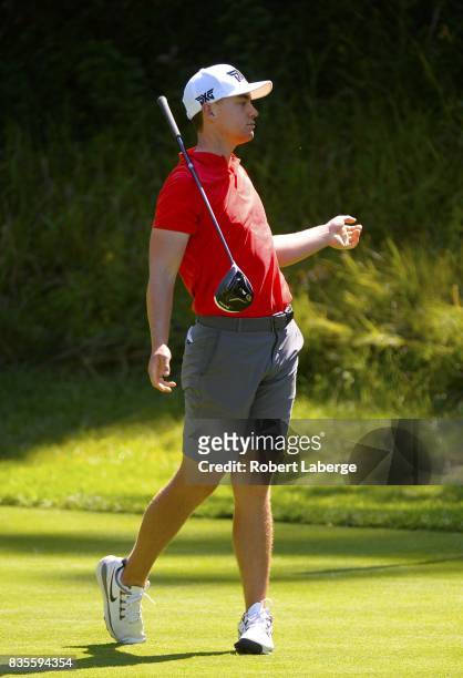 Theo Humphrey makes a tee shot on the 13th hole during his semi-final match against Doug Ghim at the USGA U.S. Amateur Championship on August 19,...