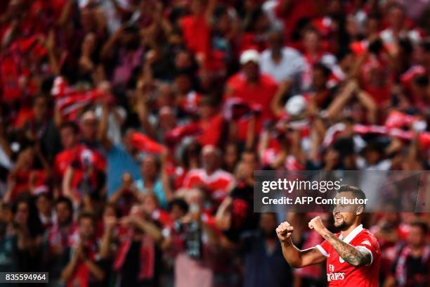 Benfica's Swiss forward Haris Seferovic celebrates after scoring during the Portuguese League football match SL Benfica vs Os Belenenses at Luz...