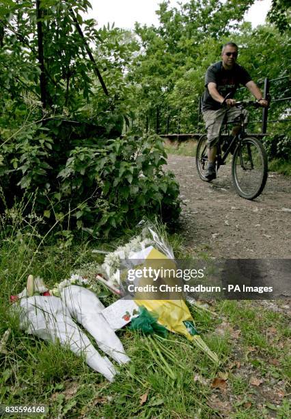 Flowers left at the scene on Ballingdon Bridge as it crosses the River Stour at Sudbury, after a six-year-old boy died after falling into the river...