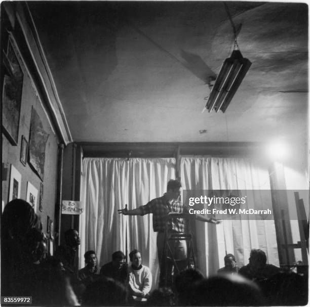 American author Jack Kerouac gestures expansively as he reads poetry at the Artist's Studio , New York, New York, February 15, 1959.