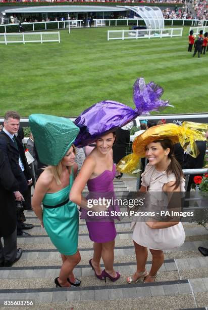 Sophie Kerr, Alana Davidson and Jenni Thompson during ladies day at Ascot Racecourse, Berkshire