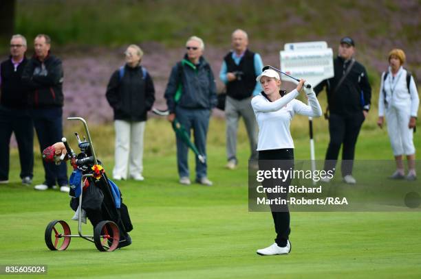 Paula Kimer of Germany hits an approach shot during her semi-final match during the Girls' British Open Amateur Championship at Enville Golf Club on...