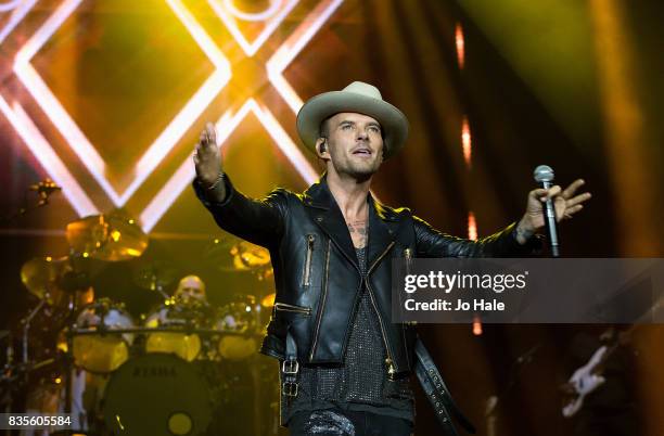 Luke Goss and Matt Goss of Bros perform at The O2 Arena on August 19, 2017 in London, England.