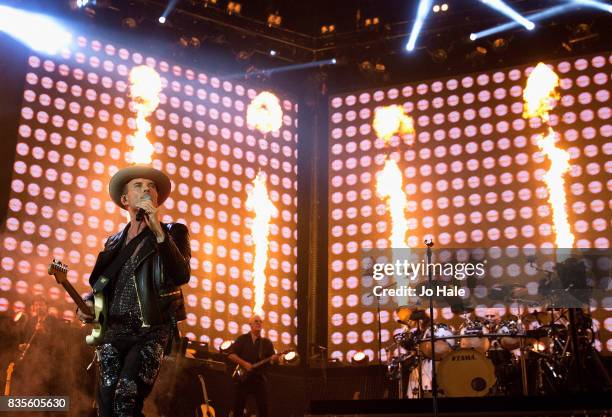 Luke Goss and Matt Goss of Bros perform at The O2 Arena on August 19, 2017 in London, England.