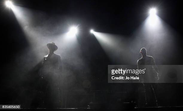 Matt Goss and Luke Goss of Bros perform at The O2 Arena on August 19, 2017 in London, England.
