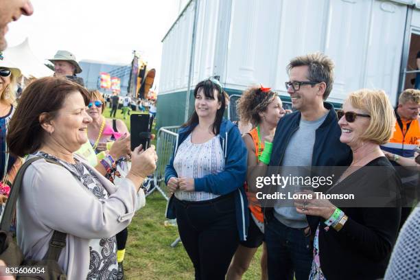 Nick Heyward poses with fans at Rewind Festival on August 19, 2017 in Henley-on-Thames, England.