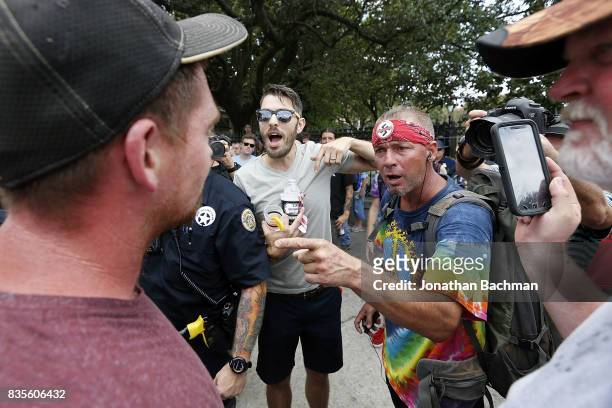 Protesters argue with a counter-protester during a demonstration on August 19, 2017 in New Orleans, United States. The rally was held in solidarity...