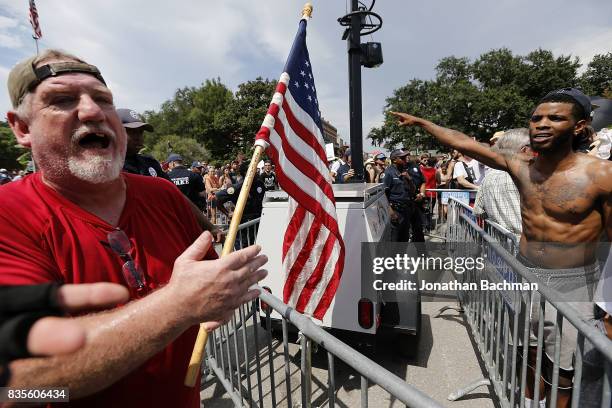 Protesters and counter-protesters argue during a demonstration on August 19, 2017 in New Orleans, Louisiana. The rally was held in solidarity with...