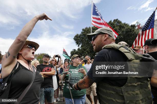 Protesters and counter-protesters argue during a demonstration on August 19, 2017 in New Orleans, Louisiana. The rally was held in solidarity with...