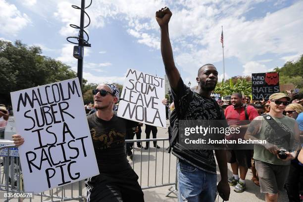 Protesters and counter-protesters argue during a demonstration on August 19, 2017 in New Orleans, Louisiana. The rally was held in solidarity with...