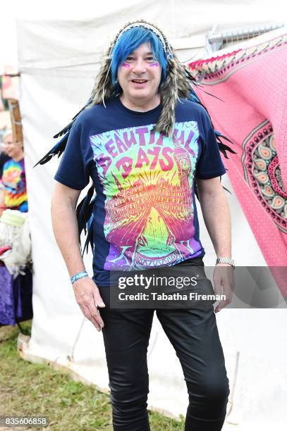 Festival goer enjoys the atmosphere during Beautiful Days Festival at Escot Park on August 19, 2017 in Exeter, England.