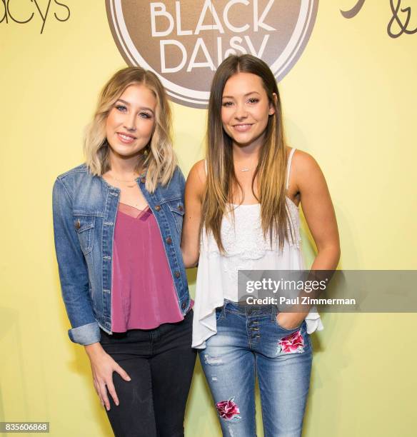 Madison Marlow and Taylor Dye of Maddie & Tae visit Macy's Herald Square on August 19, 2017 in New York City.