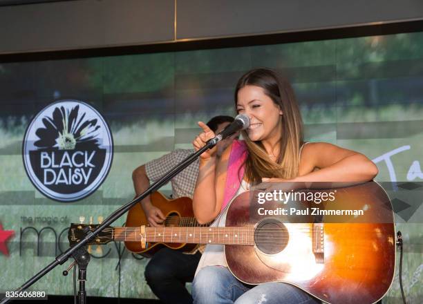 Taylor Dye of Maddie & Tae performs at Macy's Herald Square on August 19, 2017 in New York City.