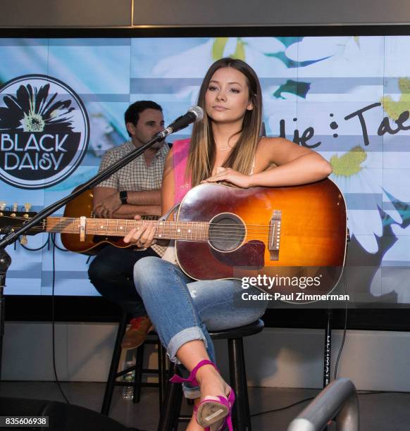 Taylor Dye of Maddie & Tae performs at Macy's Herald Square on August 19, 2017 in New York City.