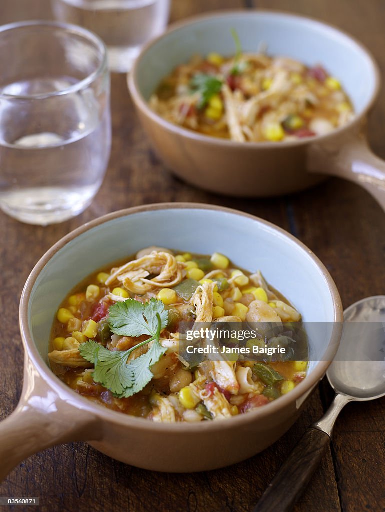Mexican pozole soup with corn and chicken