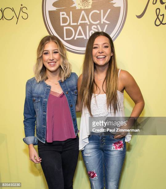 Madison Marlow and Taylor Dye of Maddie & Tae visit Macy's Herald Square on August 19, 2017 in New York City.
