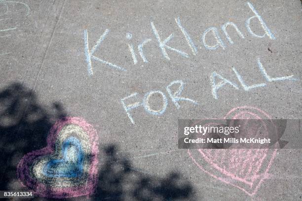 Chalk art outside of Google's offices during an anti-Trump protest on August 19, 2017 in Kirkland, Washington. The demonstration was held in...