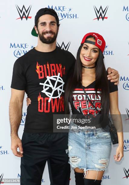 Superstar Seth Rollins and Nikki Bella attend the WWE Superstars Surprise Make-A-Wish Families at One World Observatory on August 19, 2017 in New...